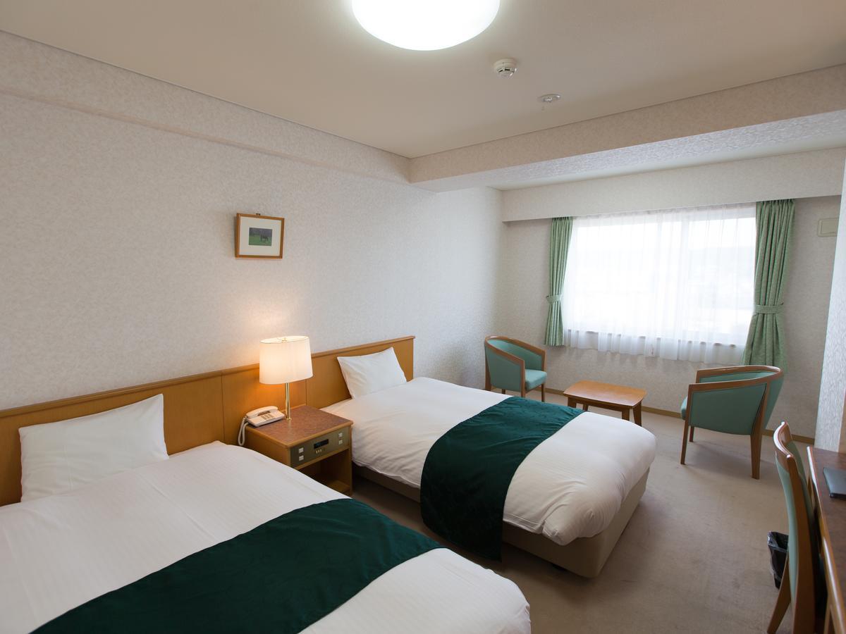 Hotel Laurel Shinhidaka Номер фото